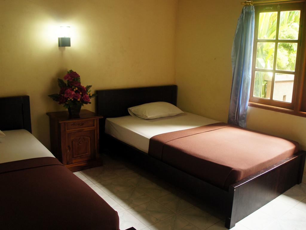 Waringin Homestay Kuta  Bilik gambar