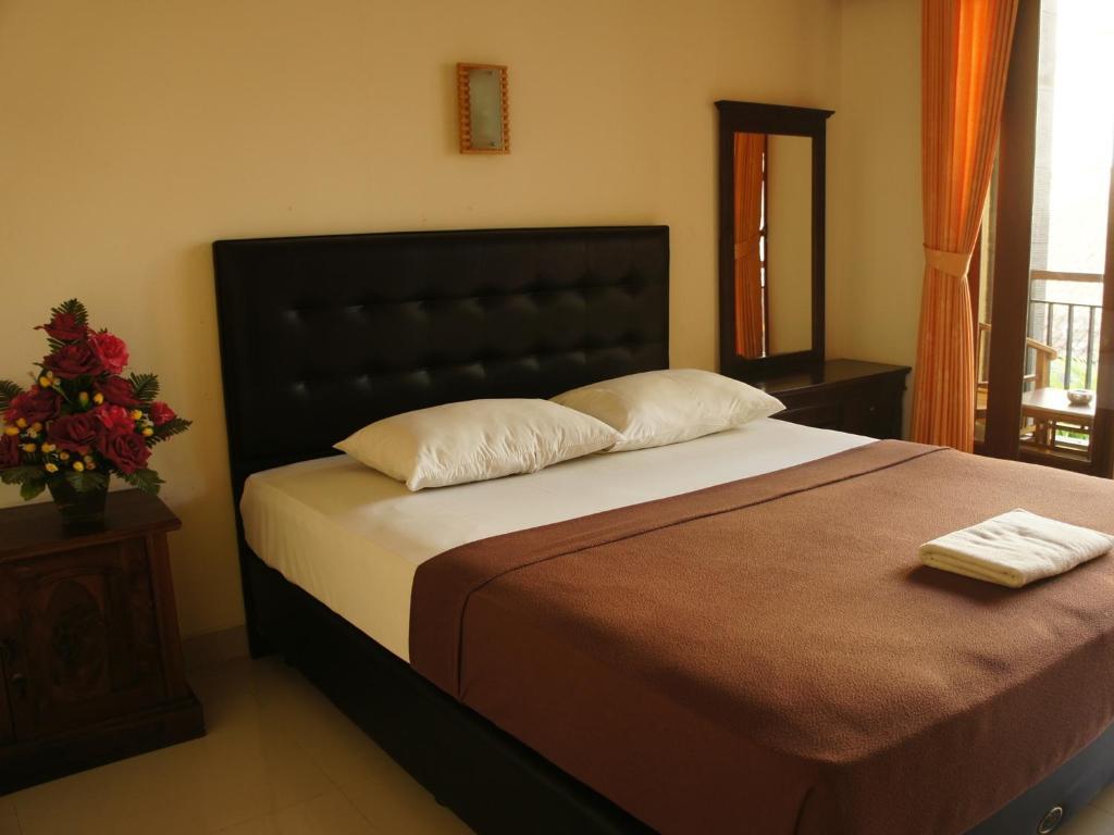 Waringin Homestay Kuta  Bilik gambar